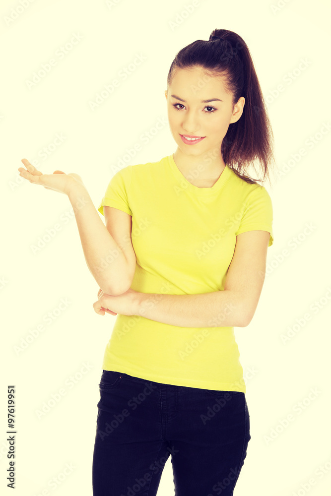 Woman holding something on palm. Woman holding something on palm.