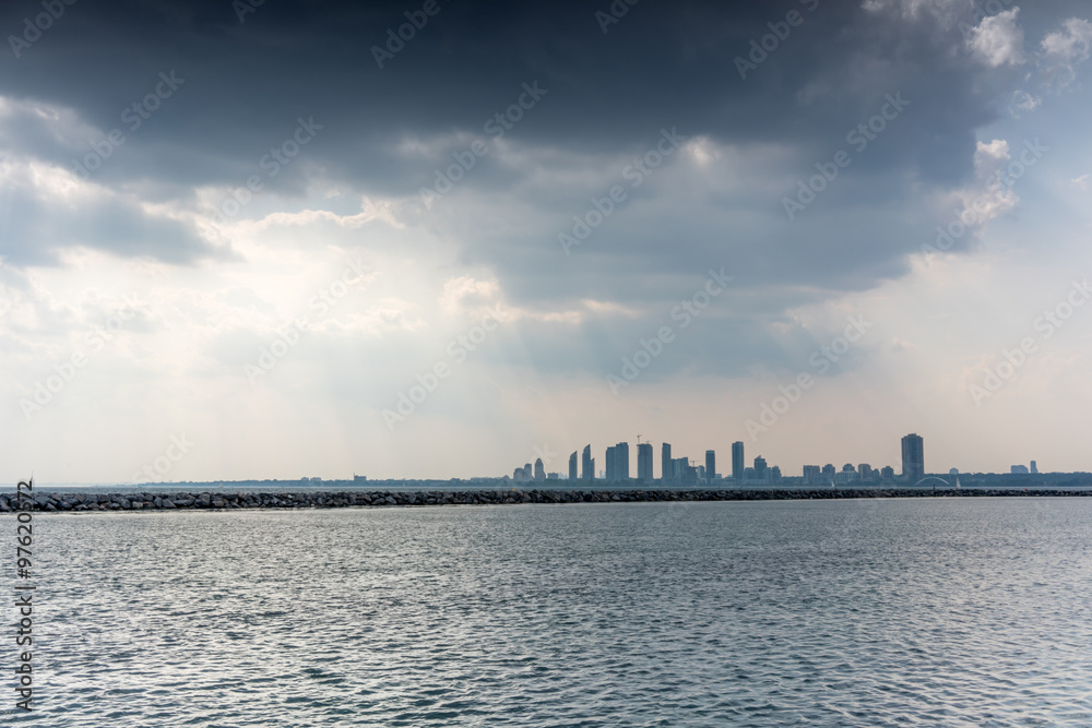 Distant view of city at the waterfront, Toronto, Ontario, Canada