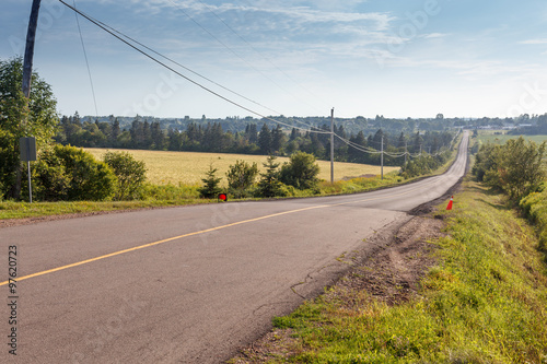 Empty road passing through landscape, Prince Edward Island, Canada