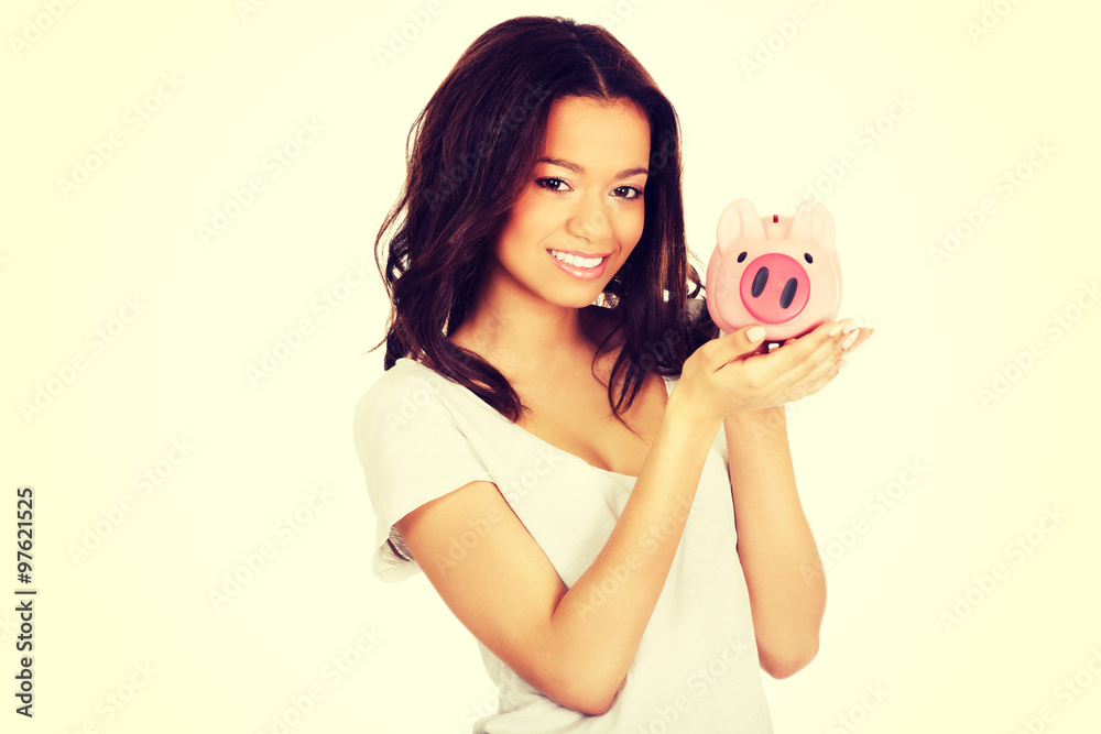 African woman with piggybank. African woman with piggybank.