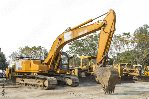 Big excavator on parking outdoor