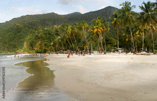 Tourists enjoying at beach, Trinidad, Trinidad And Tobago