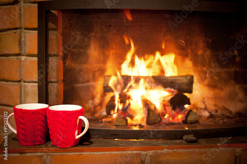 two cups of the fireplace