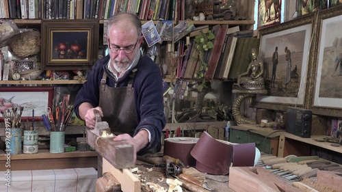 carpenter working in his workshop photo