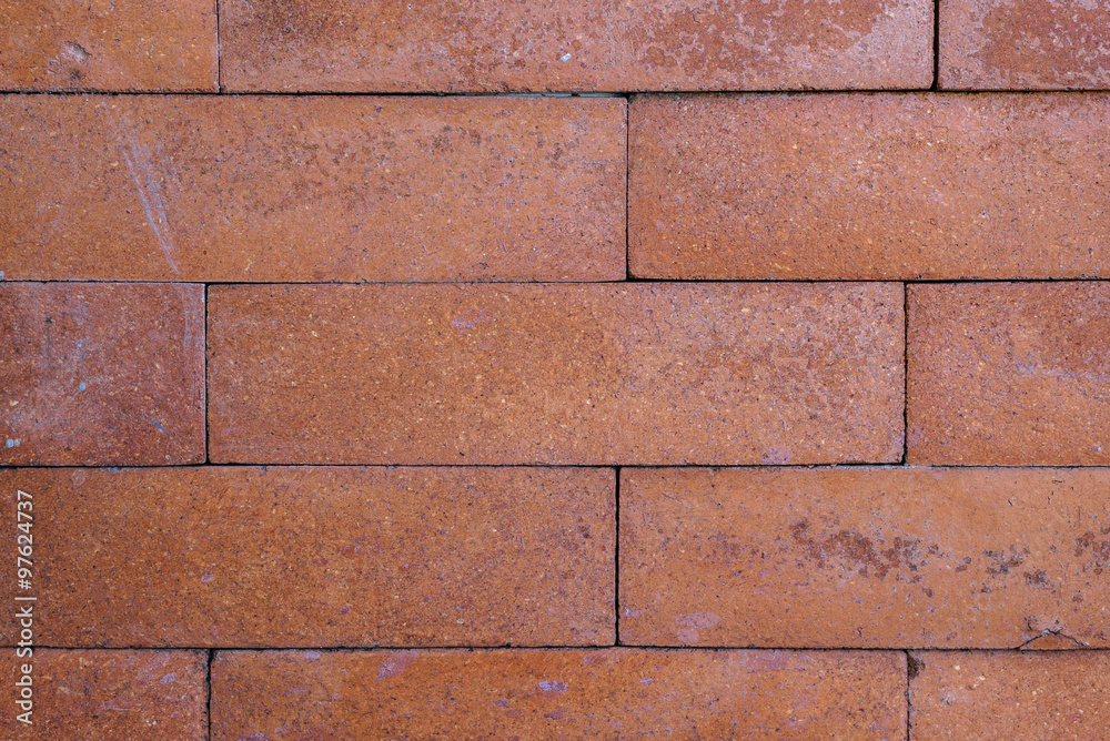 Weathered stained old brick wall background. Weathered stained old brick wall background.