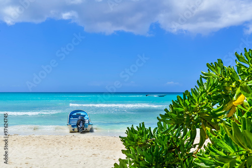 Boat on Tropical Beach at Exotic Island