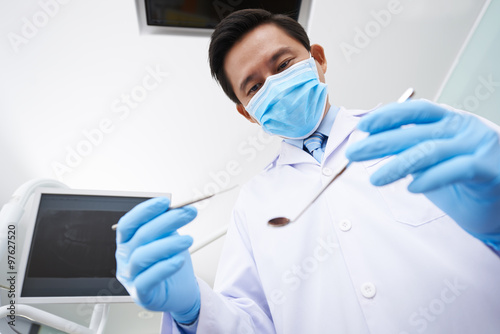 Dentist with medical tools