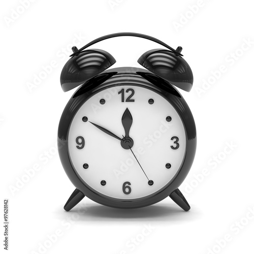 Black alarm clock on white