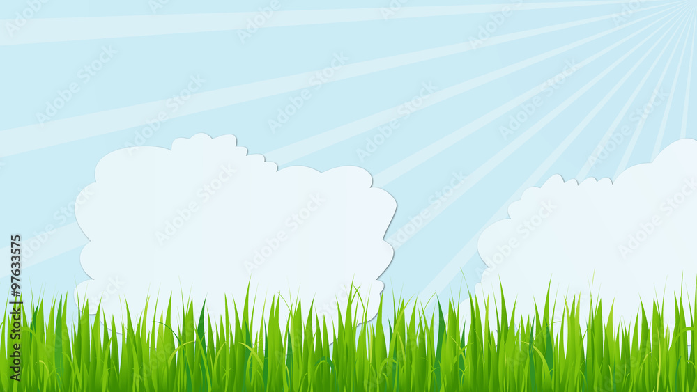 Clouds and sun rays on grass