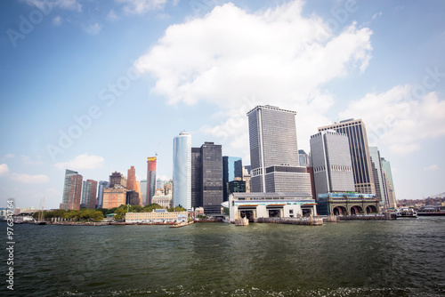 financial district of manhattan in new york city seen from the ferry to staten island during a sunny day
