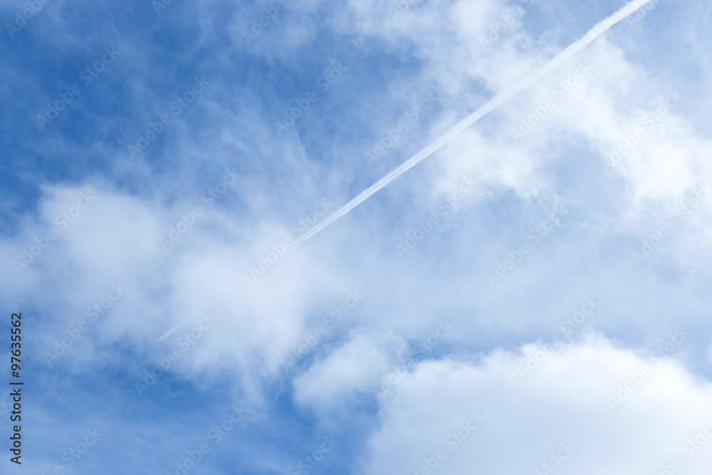 Jet trail in clear blue sky Jet trail in clear blue sky