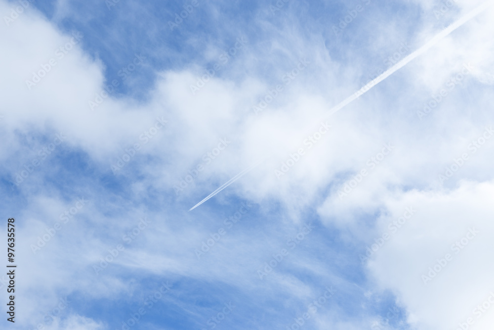 Jet trail in clear blue sky Jet trail in clear blue sky