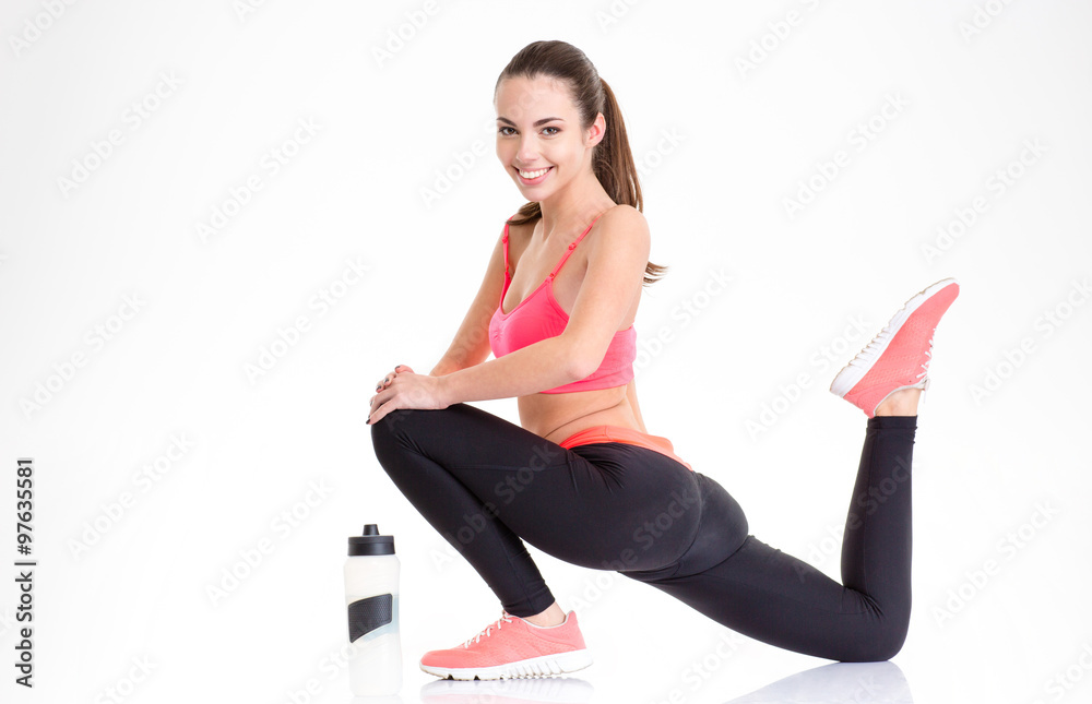 Fototapeta premium Attractive cheerful fitness woman working out