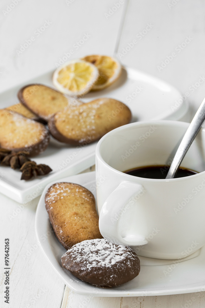 Assorted Cookies with coffee on wooden table Assorted Cookies with coffee on wooden table