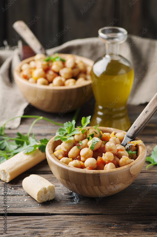Vegeterian cooked chickpea with tomato and parsley Vegeterian cooked chickpea with tomato and parsley