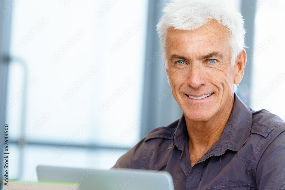 Handsome businessman in office Handsome businessman in office