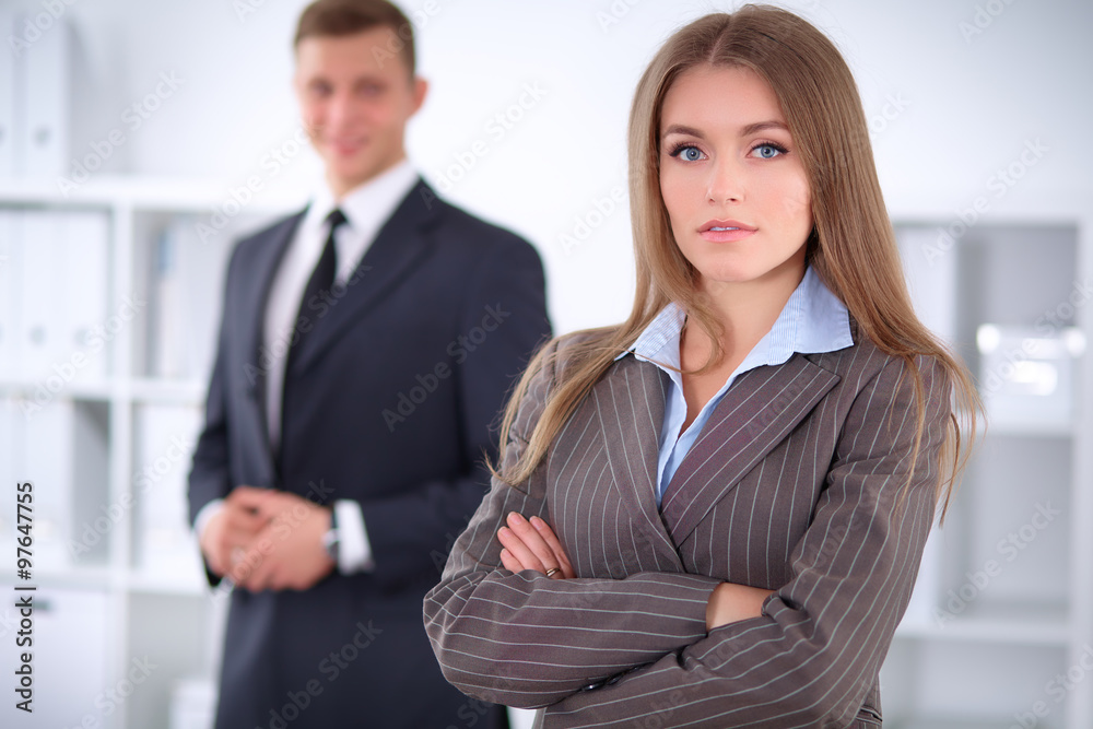 Face of beautiful business woman on the background of business people Face of beautiful business woman on the background of business people