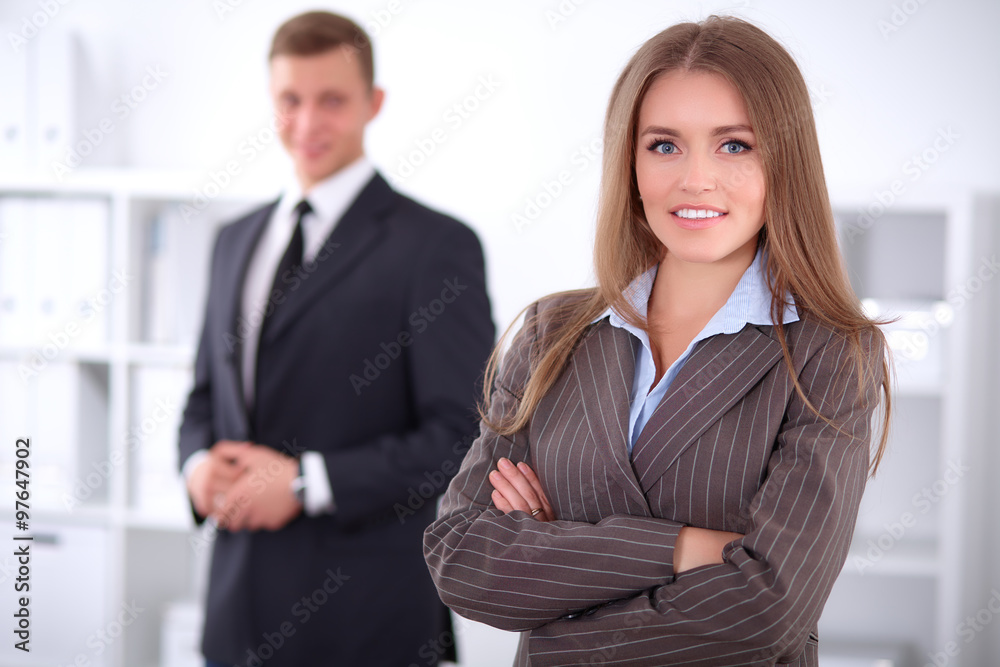 Face of beautiful business woman on the background of business people Face of beautiful business woman on the background of business people