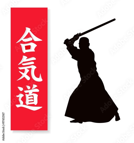 A man demonstrating Aikido and hieroglyph of Aikido.