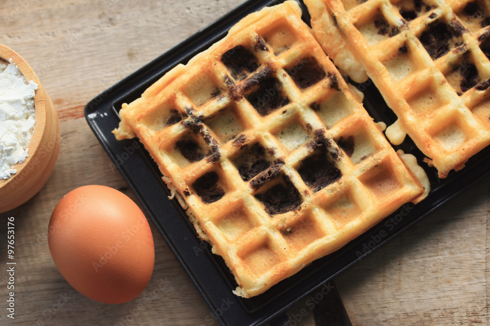 tasty waffle with cooking