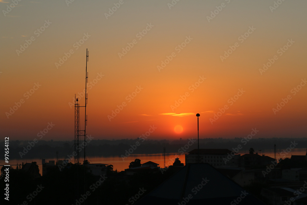 Fototapeta premium Sunrise over Mekong River in a Mukdahan city skylin