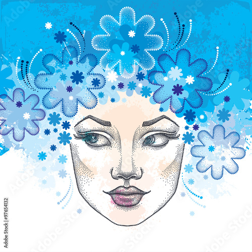 Fototapeta Naklejka Na Ścianę i Meble -  Dotted beautiful woman face with snowflakes on the blue background with blots. Concept of winter and female beauty in dotwork style.