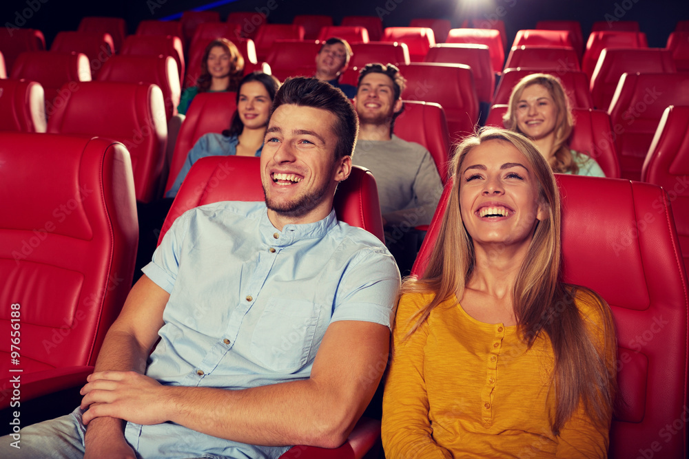happy friends watching movie in theater happy friends watching movie in theater