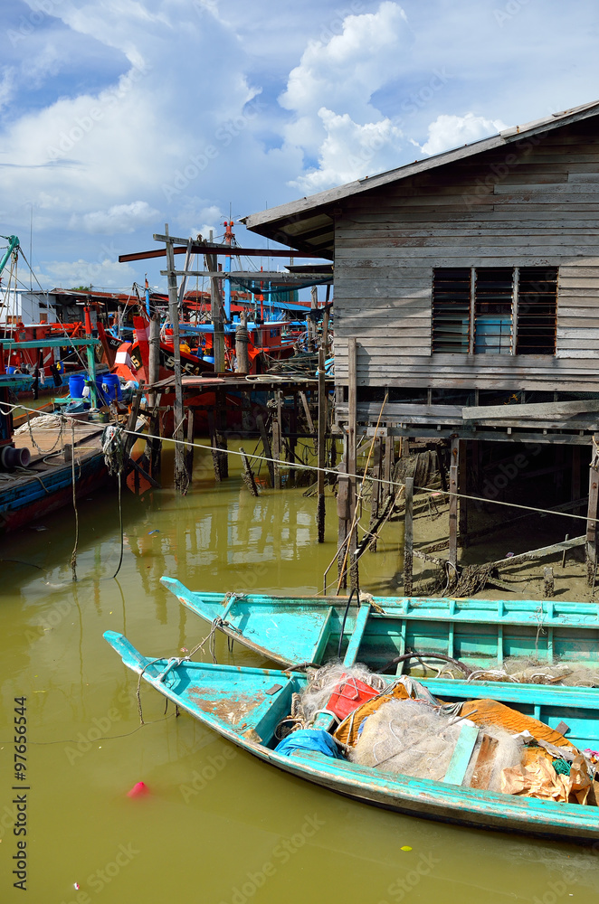 Colorful chinese fishing boat resting at a Chinese Fishing Village- Sekinchan, Malaysia.. Colorful chinese fishing boat resting at a Chinese Fishing Village- Sekinchan, Malaysia..