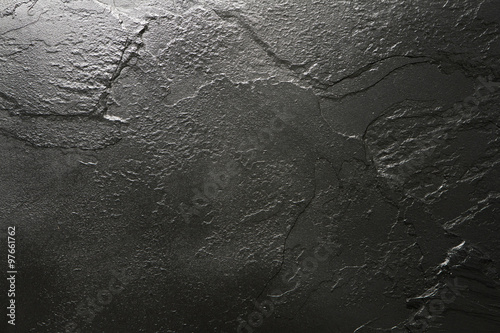Black stone texture background.