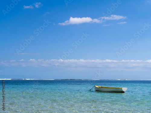 Fototapeta Naklejka Na Ścianę i Meble -  Boat in the ocean lagoon, Mauritius.