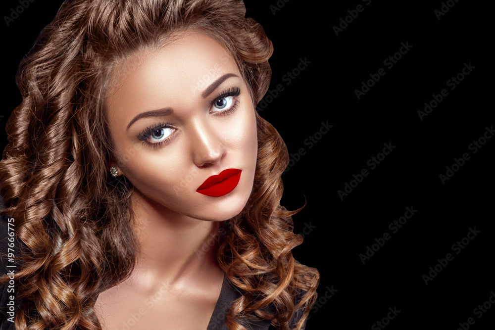 Beautiful Woman Model with Curls, Red Matte lips. Beauty face closeup. Isolated on Black Background. Long Shiny Curly Hair. Hairstyle.. Beautiful Woman Model with Curls, Red Matte lips. Beauty face closeup. Isolated on Black Background. Long Shiny Curly Hair. Hairstyle..