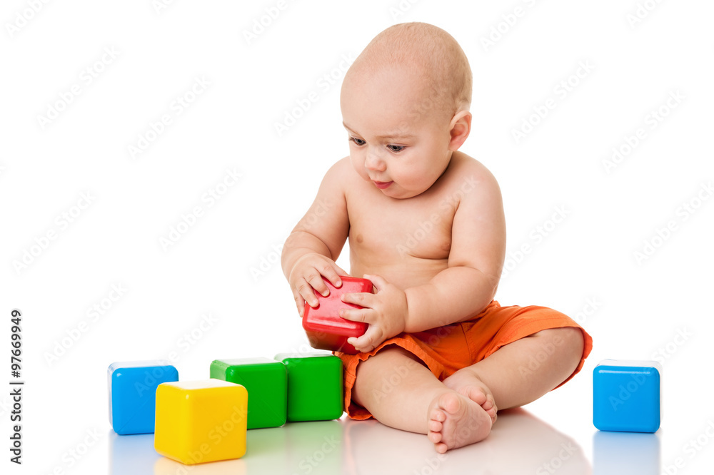 Funny little boy with blocks, isolated on white Funny little boy with blocks, isolated on white