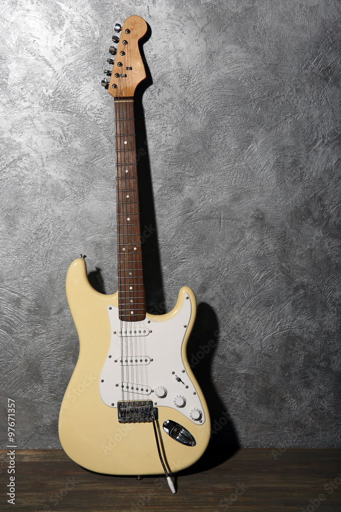 Obraz premium Guitar on grey background