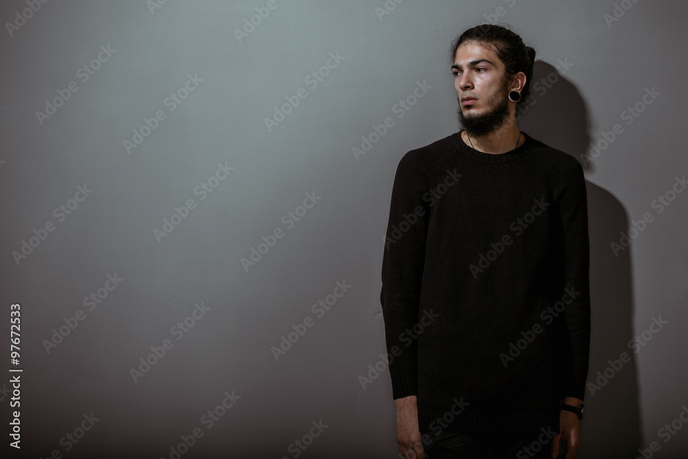 brutal young man with a beard brutal young man with a beard