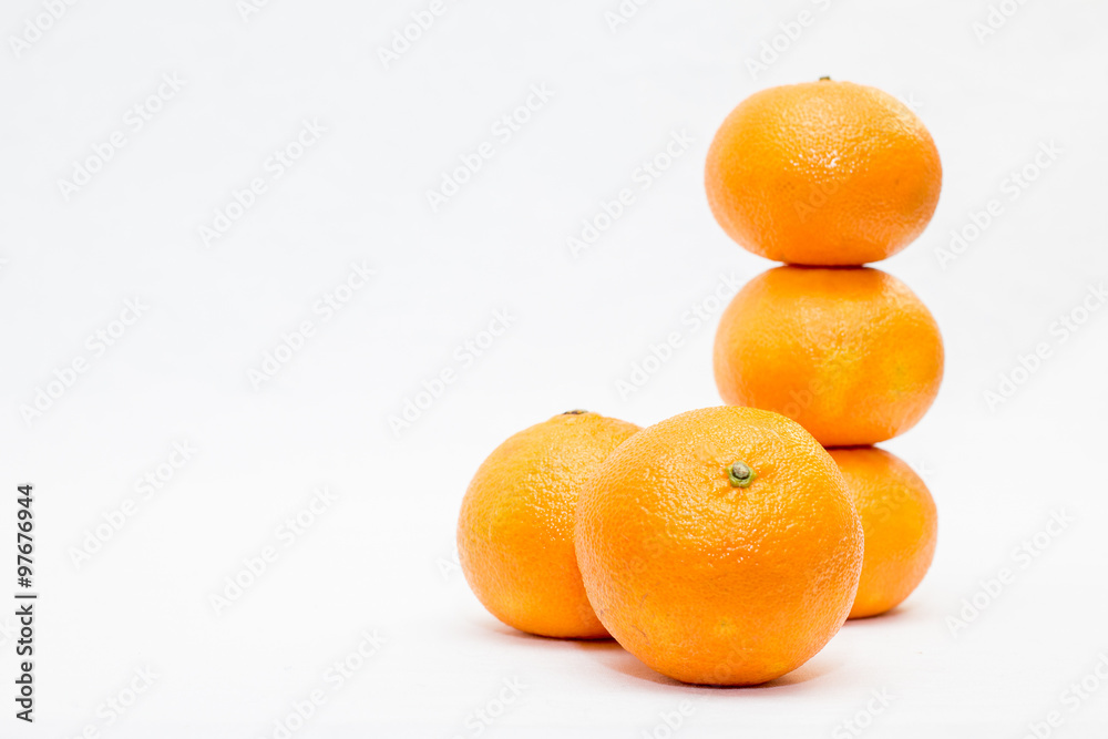 group of clementines on a white background group of clementines on a white background
