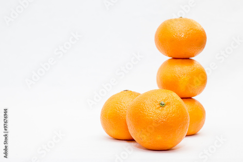 group of clementines on a white background 