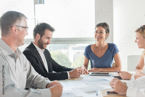 business executive is leading a project at an office business meeting