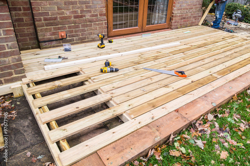 Wooden decking, deck, patio construction. photo