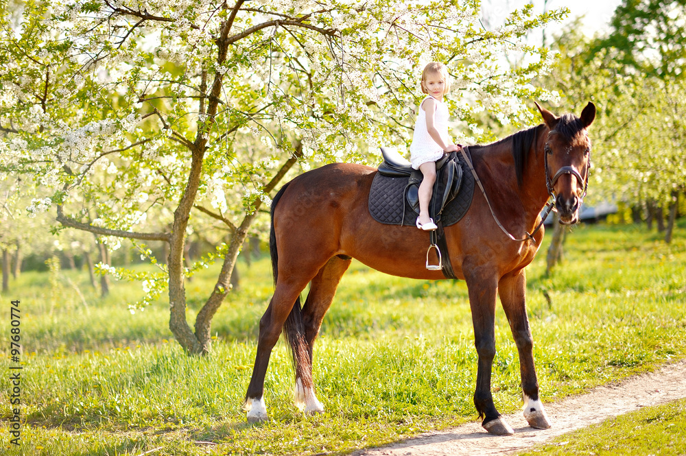 Fototapeta premium portrait of little girl outdoors in summer