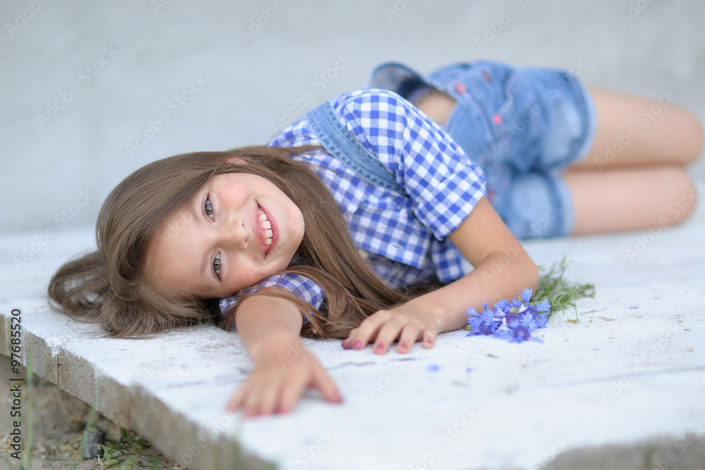 portrait of little girl outdoors in summer portrait of little girl outdoors in summer