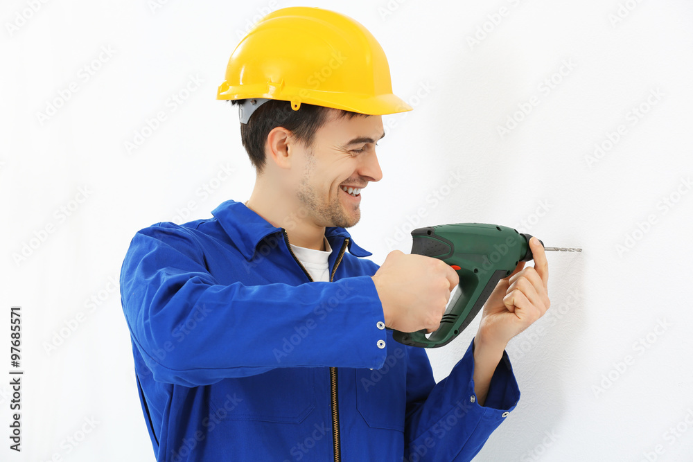 Worker renewing apartment closeup Worker renewing apartment closeup