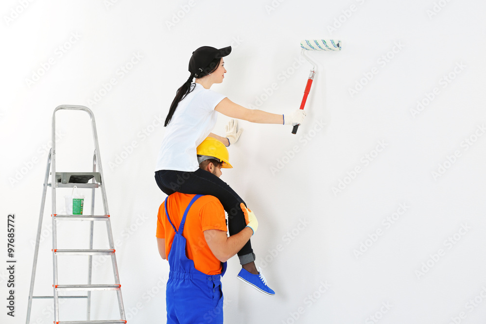 Fototapeta premium Couple renewing apartment indoor