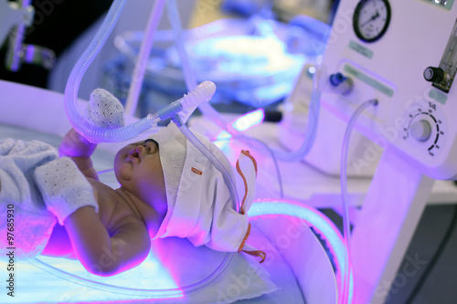 A mannequin of an infant in a hyperbaric chamber for the treatment of newborns