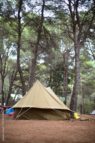 Camping with vintage textile tent in woods © beaer_photo