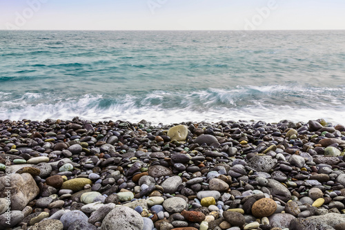 Stone Coast of Ocean with Waves