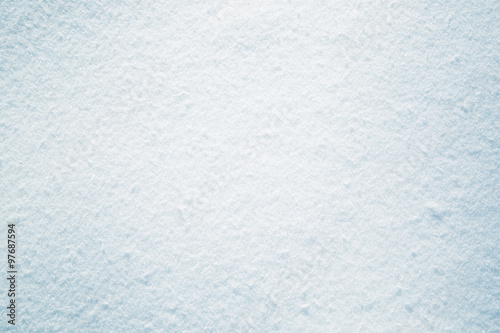 Abstract fresh snow texture detail background. Selective focus used and blue color tone used.