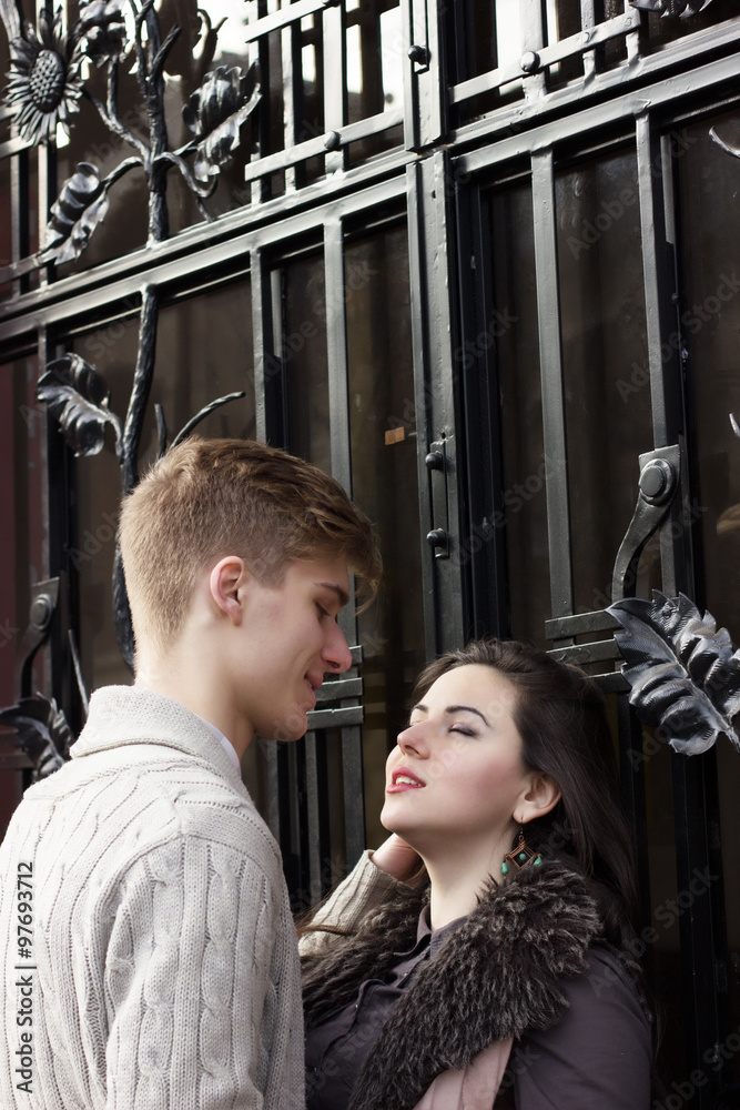 Young couple look at each other