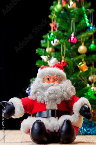 Santa Claus and Christmas decoration on wood background © jat306