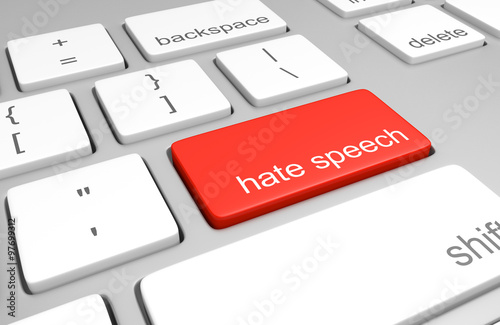 Hate speech key on a computer keyboard representing online defamatory comments