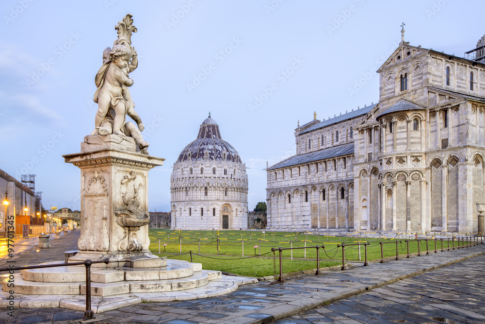 sculptures and view to baptistery and cathedral in Italy
